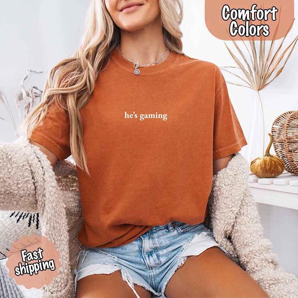 He’s Gaming – Funny Relationship Comfort Color Shirt for Her