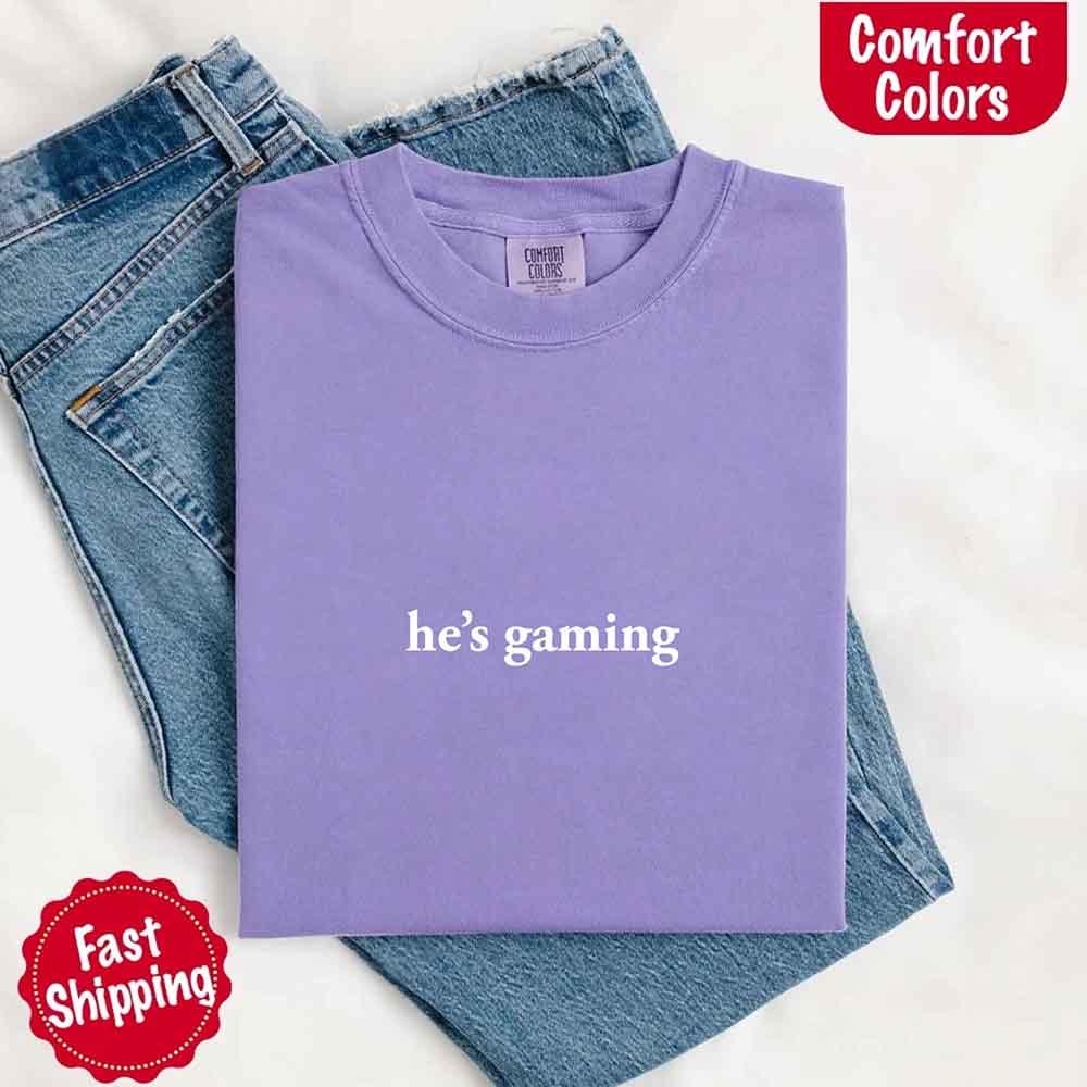 He’s Gaming – Funny Relationship Comfort Color Shirt for Her